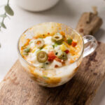 shot of microwave pizza in a mug