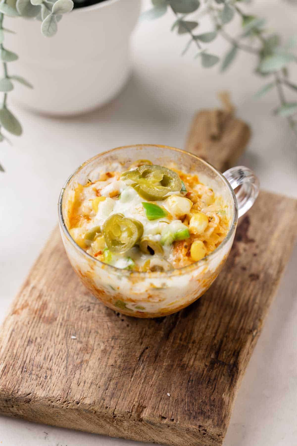 shot of microwave mexican cheesy rice in a mug