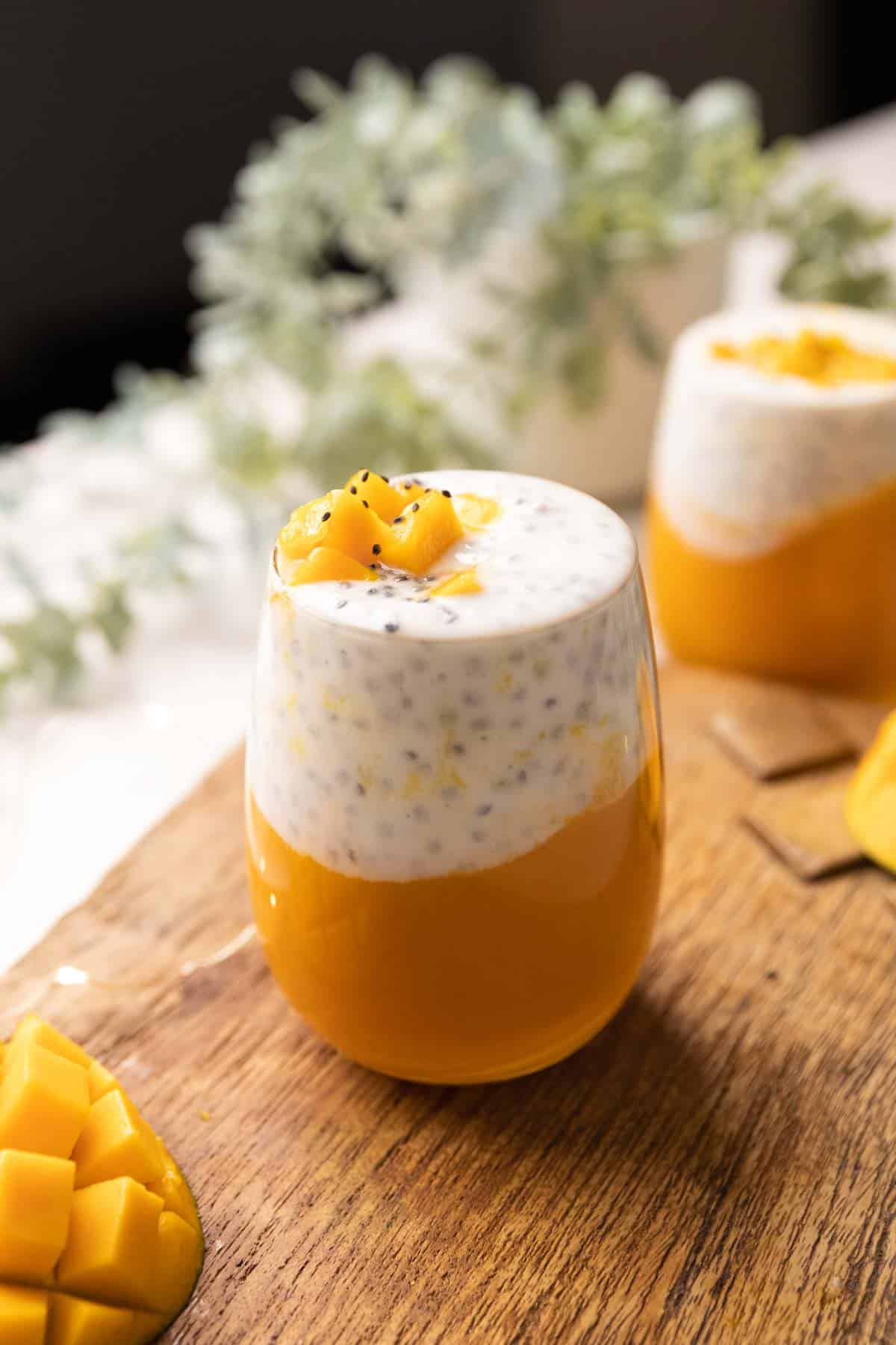 The Mango Chia seed breakfast drink served in a glass.