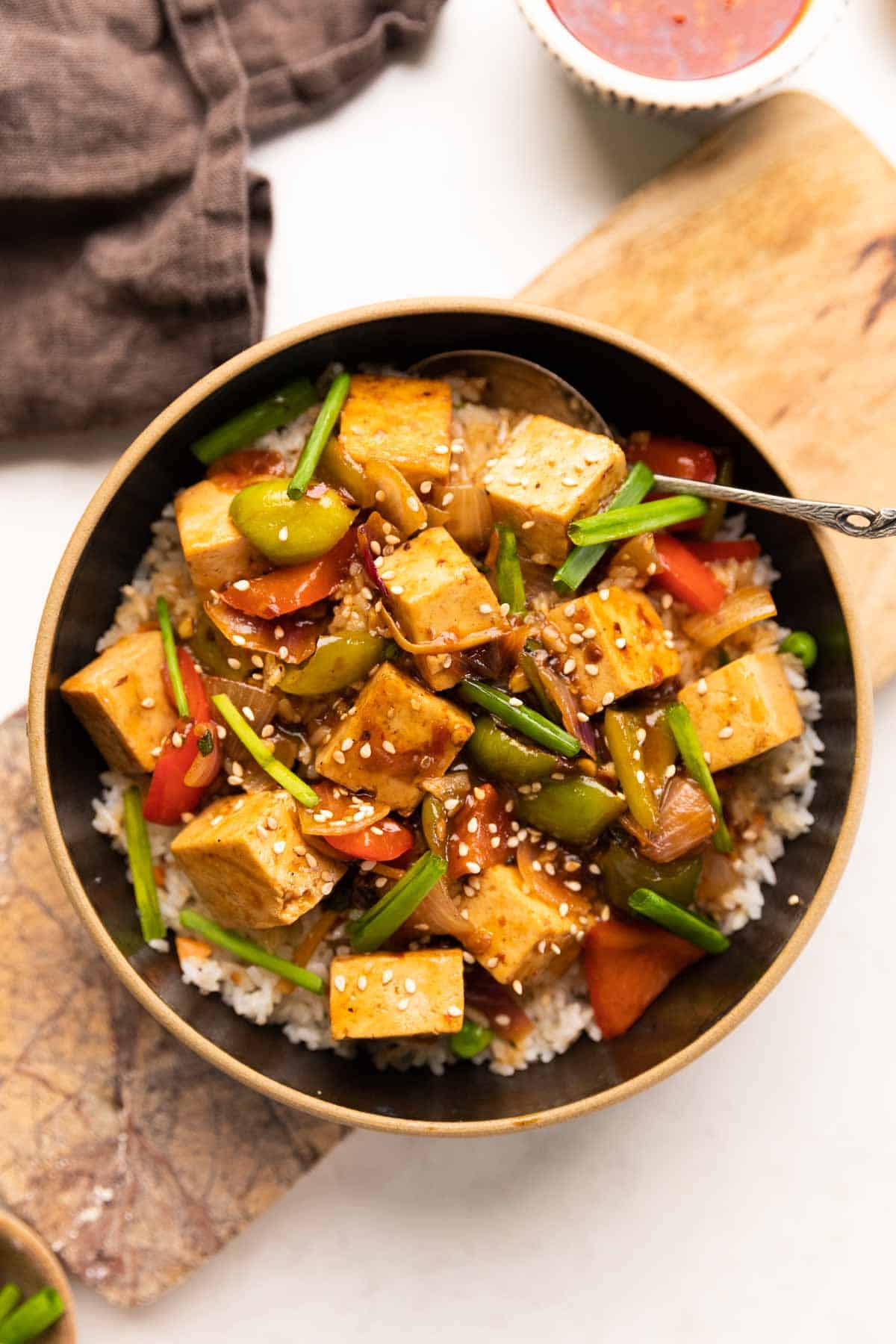 sweet chili tofu stir fry served over rice