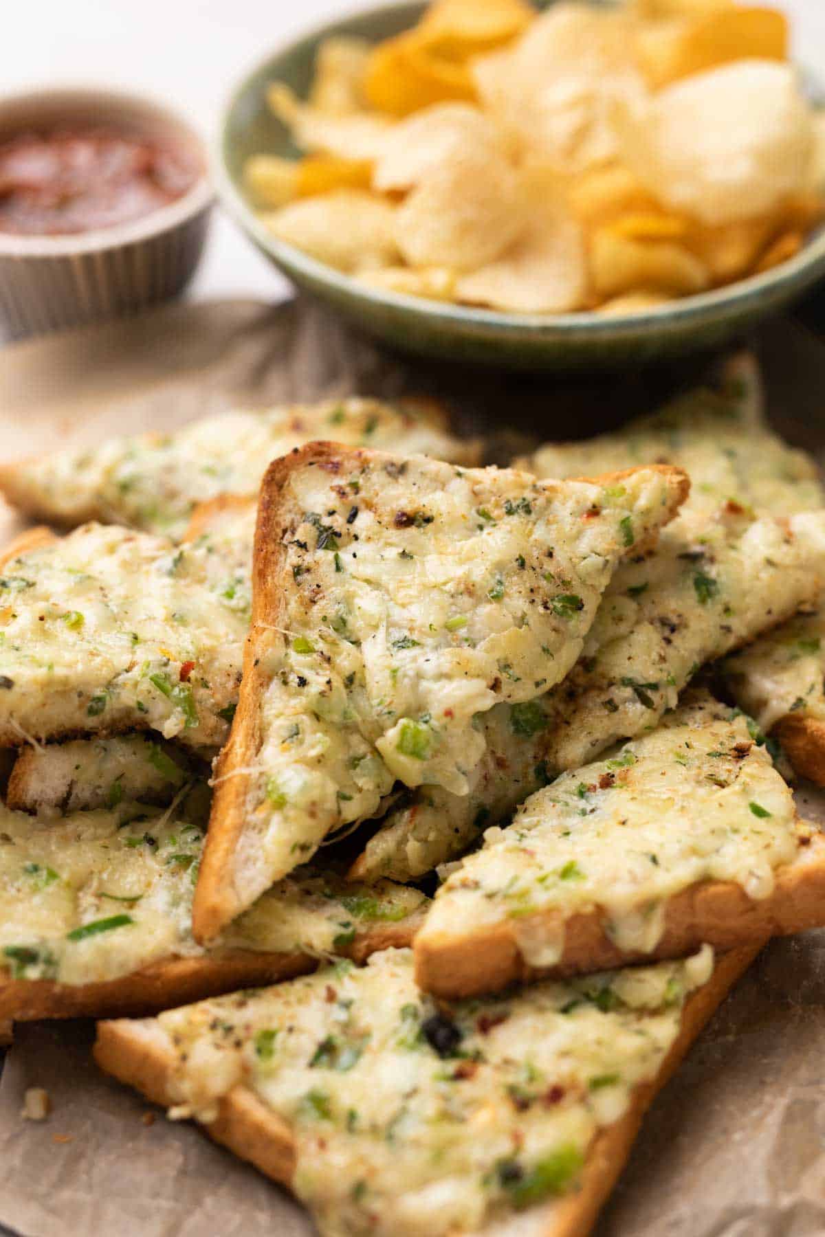 Chilli cheese garlic toasts straight from the pan on a platter