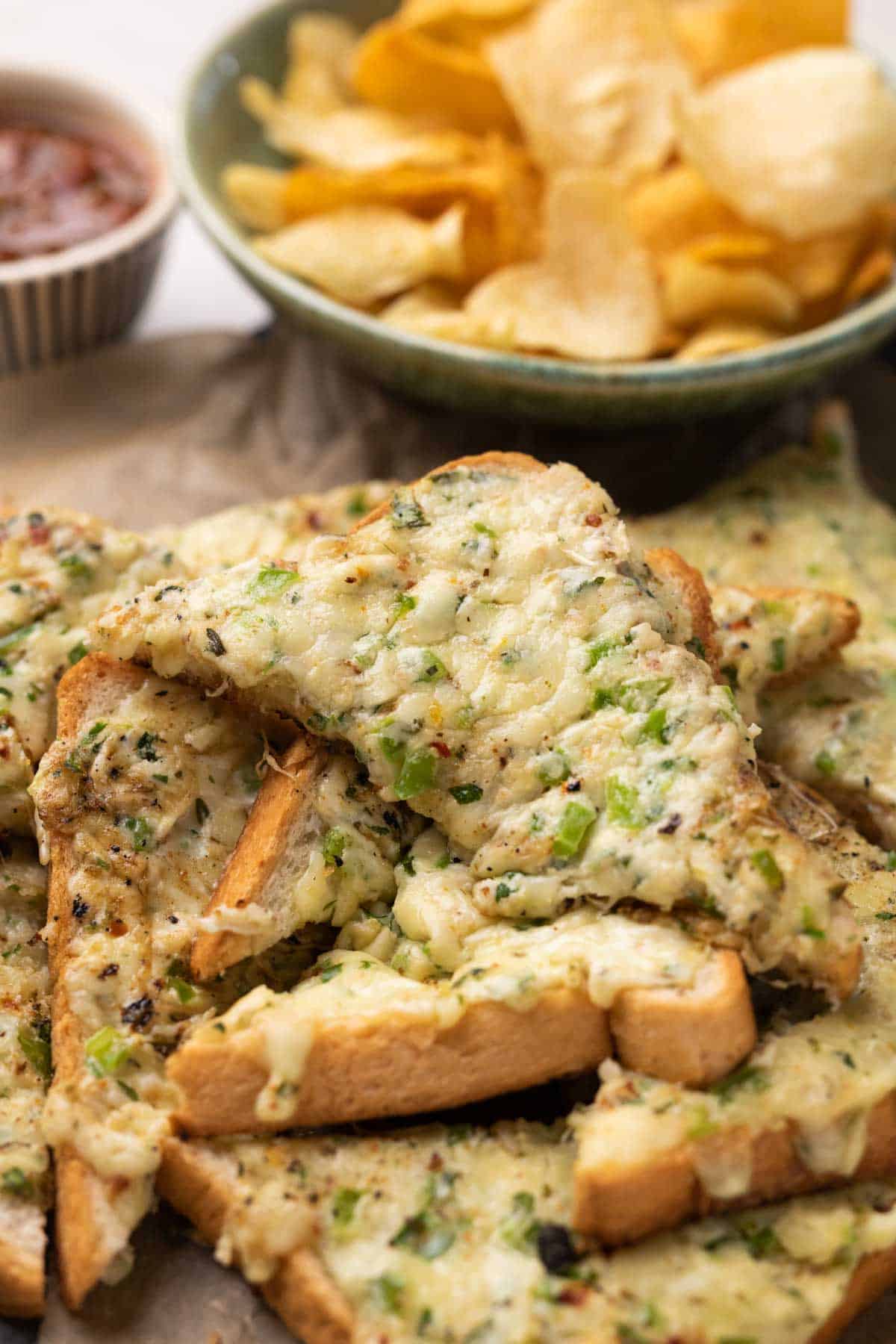 Chilli cheese garlic toasts straight from the pan on a platter