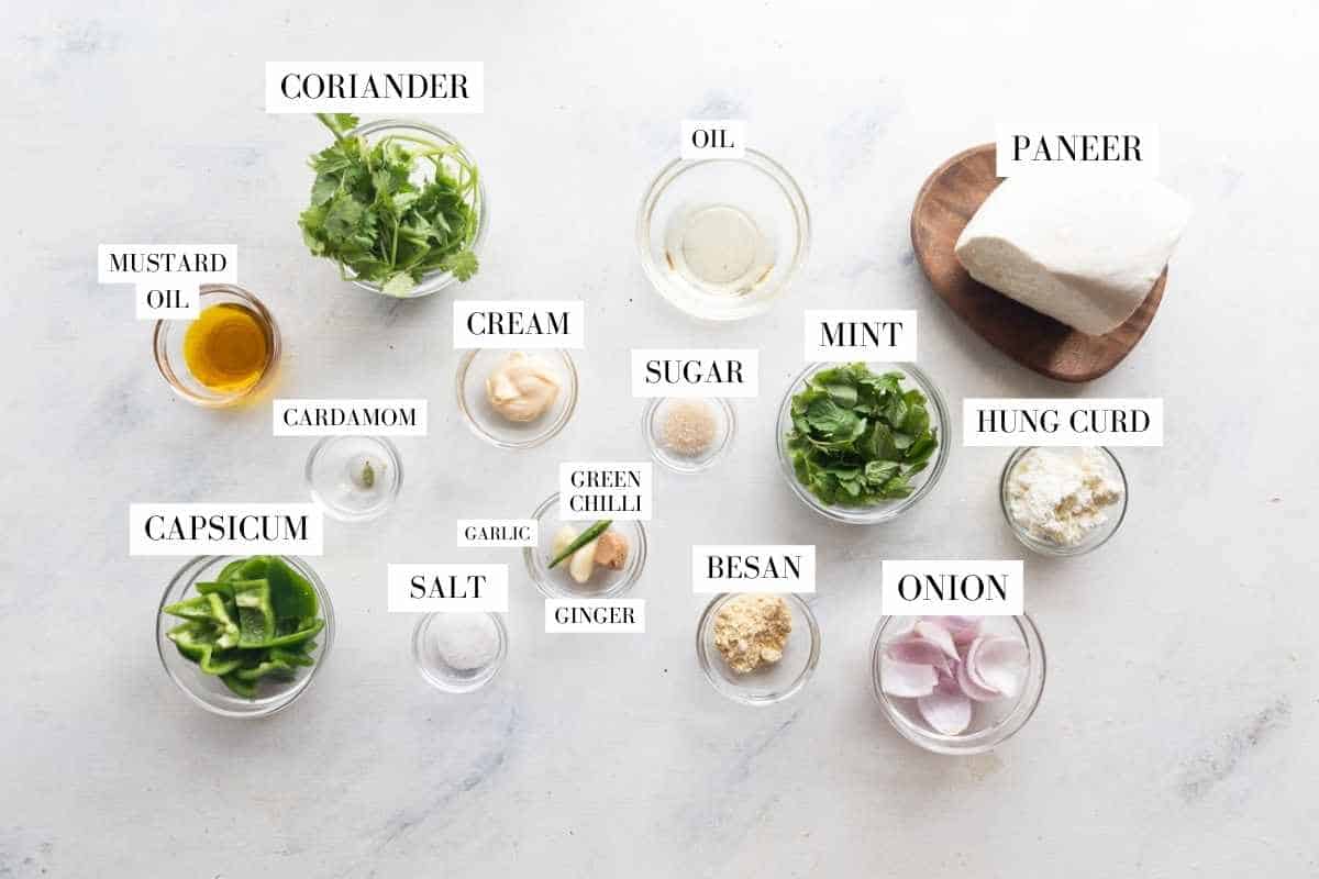 Picture of all the ingredients for Hariyali Paneer Tikka with text to identify them