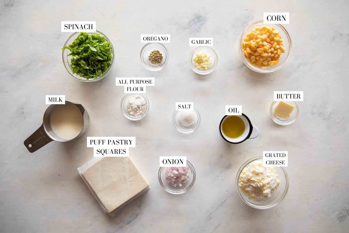 Picture of all the ingredients for Corn Spinach Puffs with text to identify them
