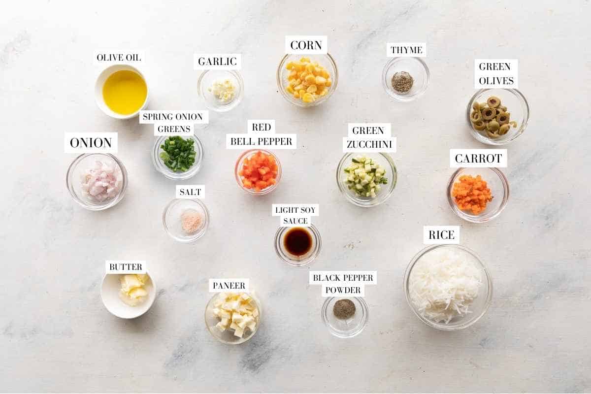Picture of all the ingredients for Rainbow Rice with text to identify them