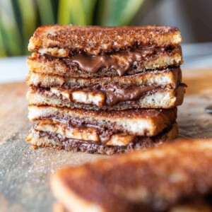 grilled chocolate banana sandwich on a wooden board