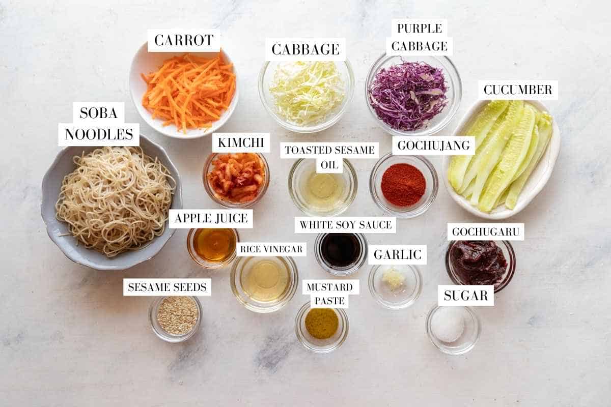 Bibim Guksu ingredients laid on a white surface with text overlay