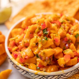 close up of mango salsa to show it's fresh and juicy texture