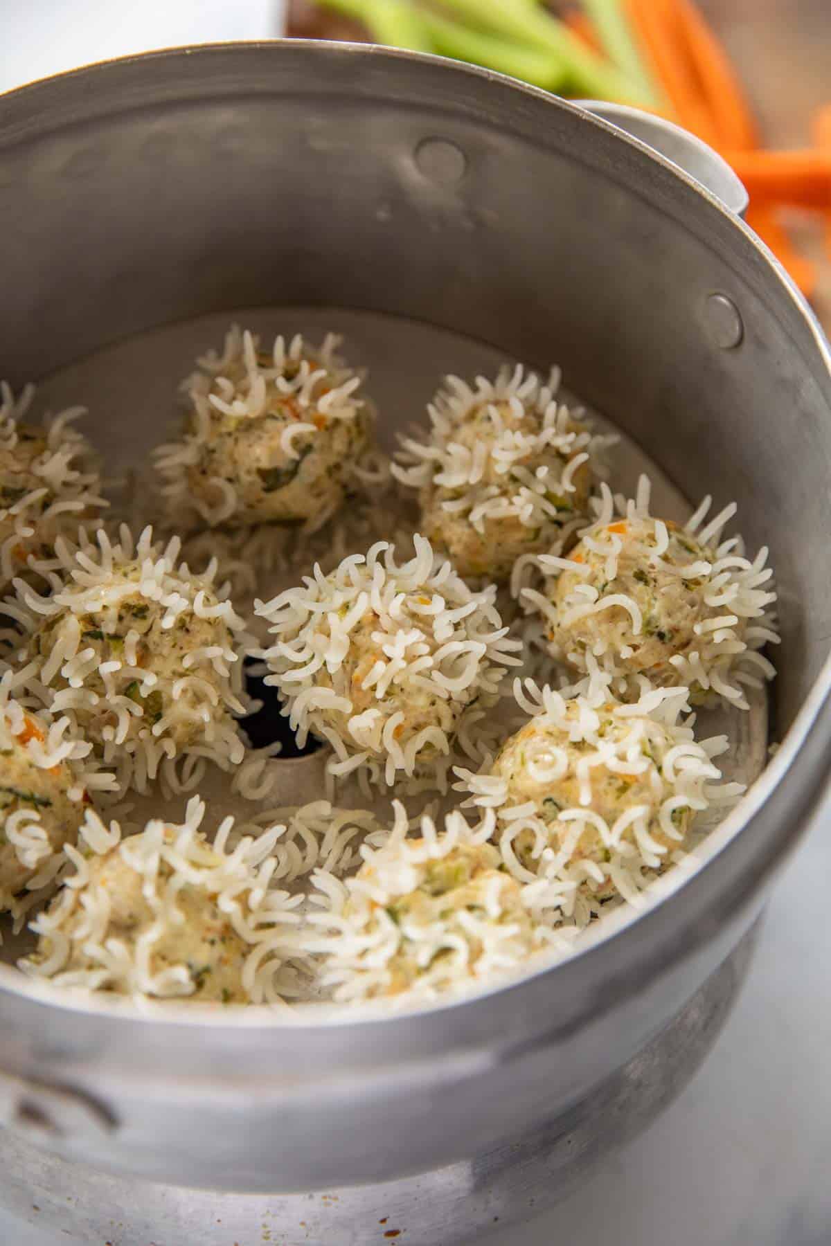 chicken porcupine meatballs placed in a steamer