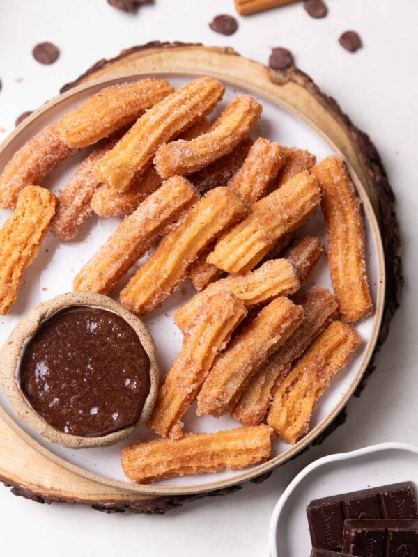 eggless churros served with chocolate sauce