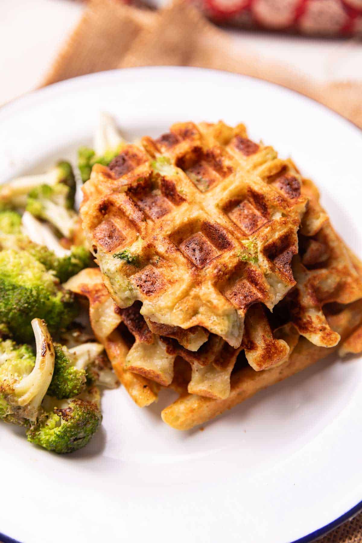 broccoli cheese waffle served with a side of roasted broccoli