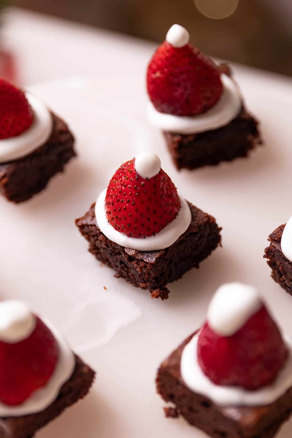 brownie bites served on a white platter
