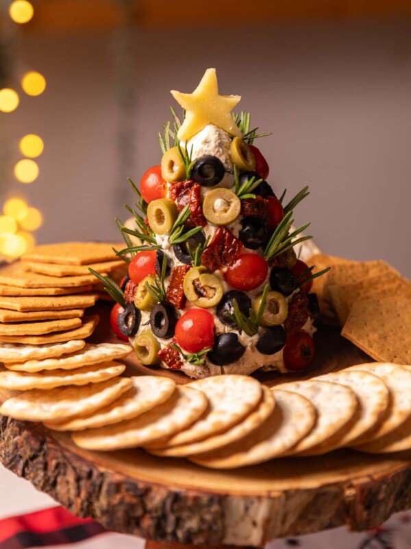 an image of cheese ball christmas tree with different crackers