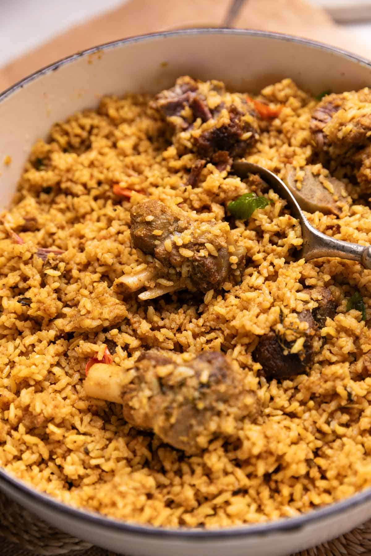 a close up image of dindigul mutton biryani to show it's texture