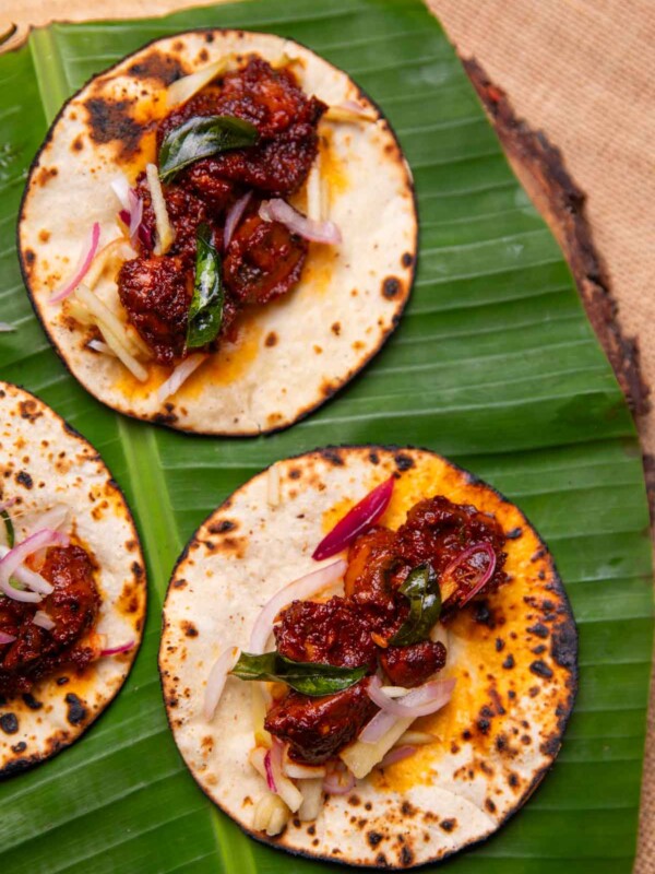 mushroom ghee roast tacos served on a leaf