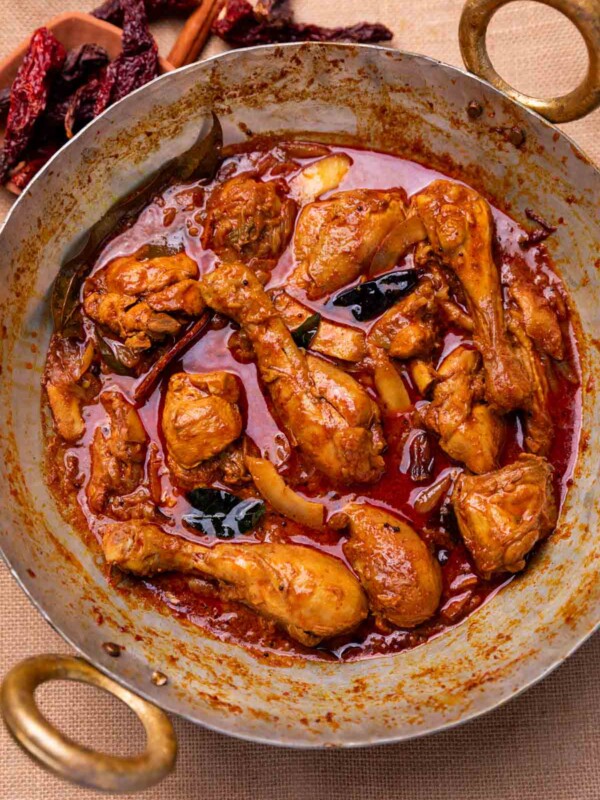 an image of freshly made nadan chicken curry in a kadai