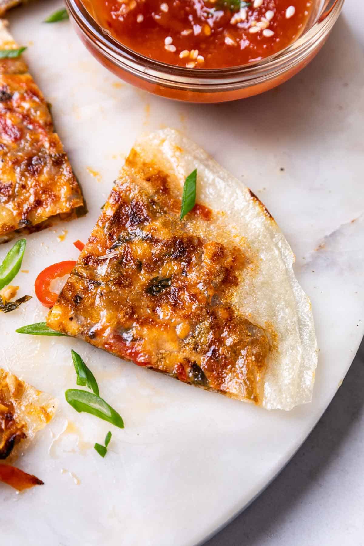 close up image of a rice paper pancake to show it's crispy texture