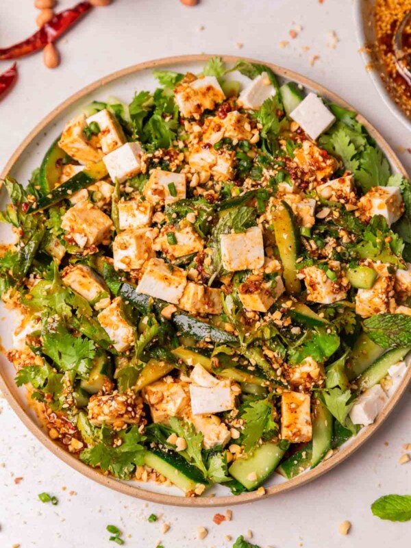 Asian cucumber salad served on a white platter ready to be eaten