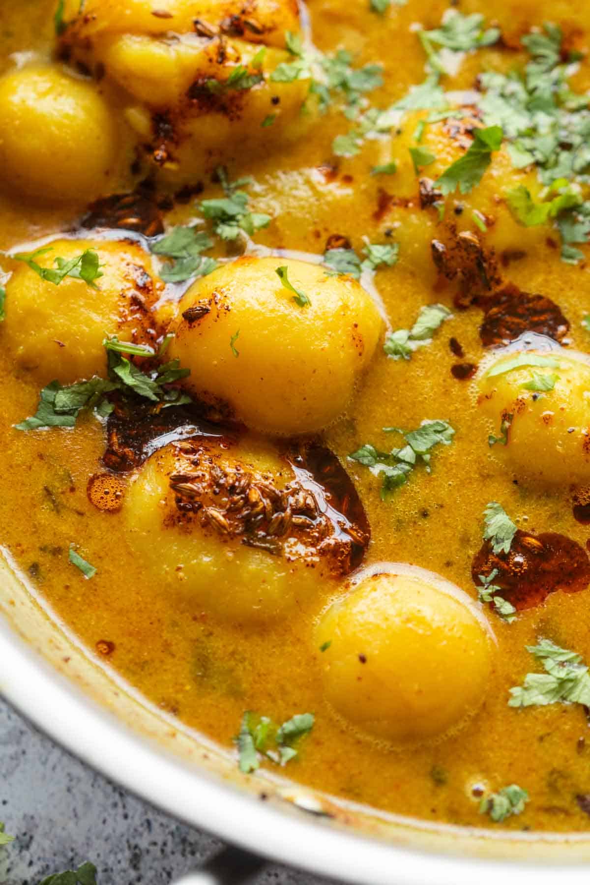 close up of dahi aloo sabzi to show it's texture