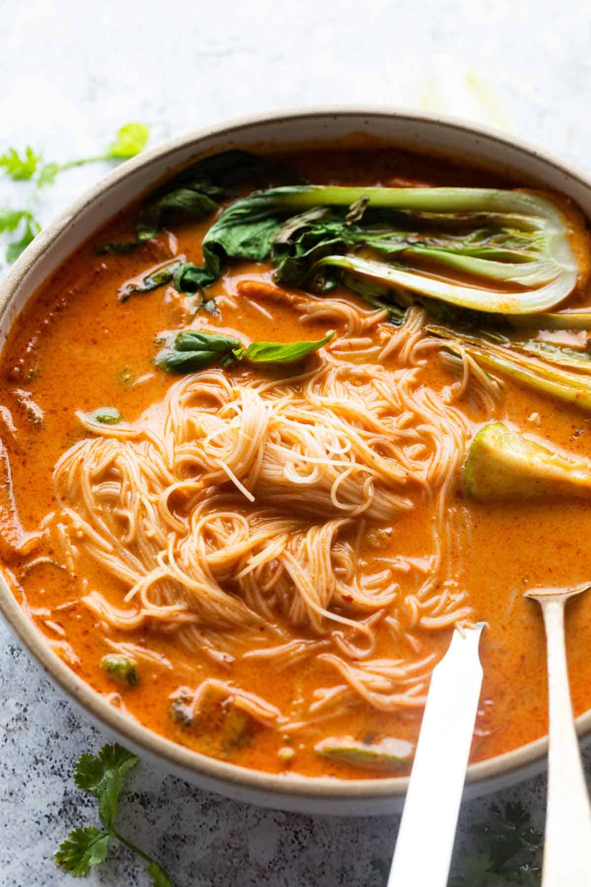 thai curry soup served in a bowl ready to be eaten