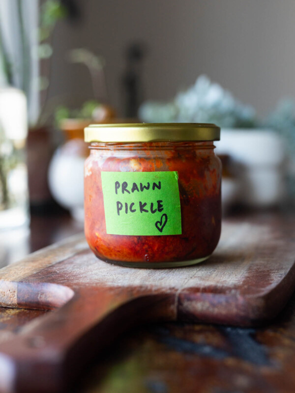 A bottle of prawn pickle labelled in green tape
