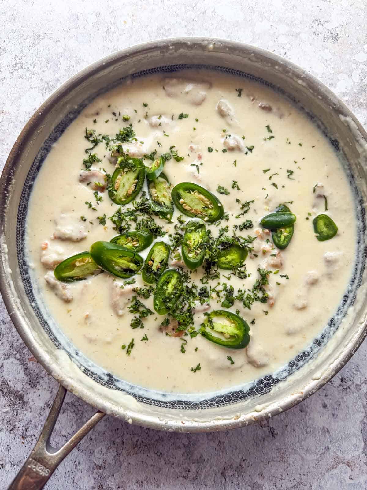 freshly made creamy japan chicken still in it's cooking saucepan