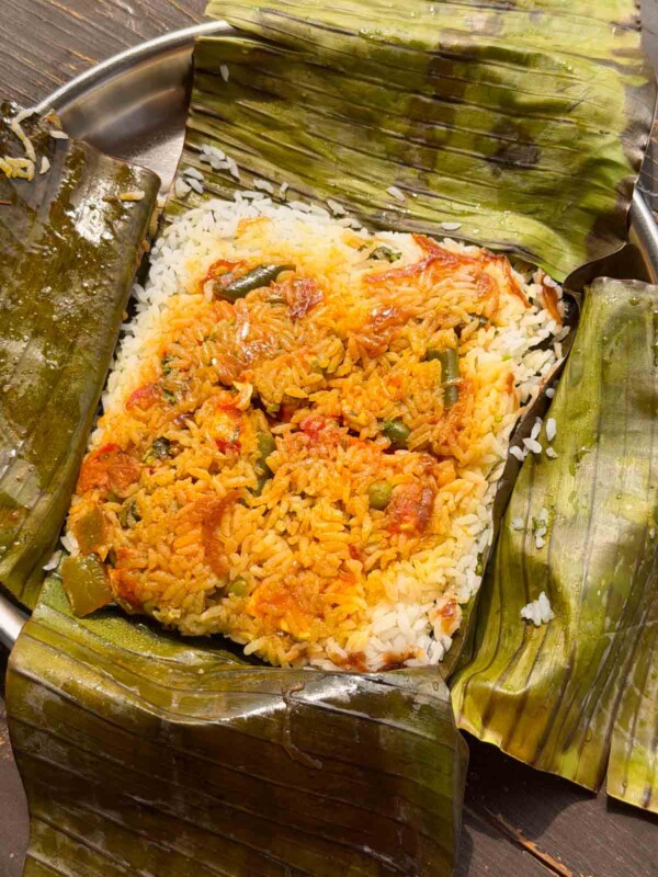close up image of veg steamed potli biryani ready to be served