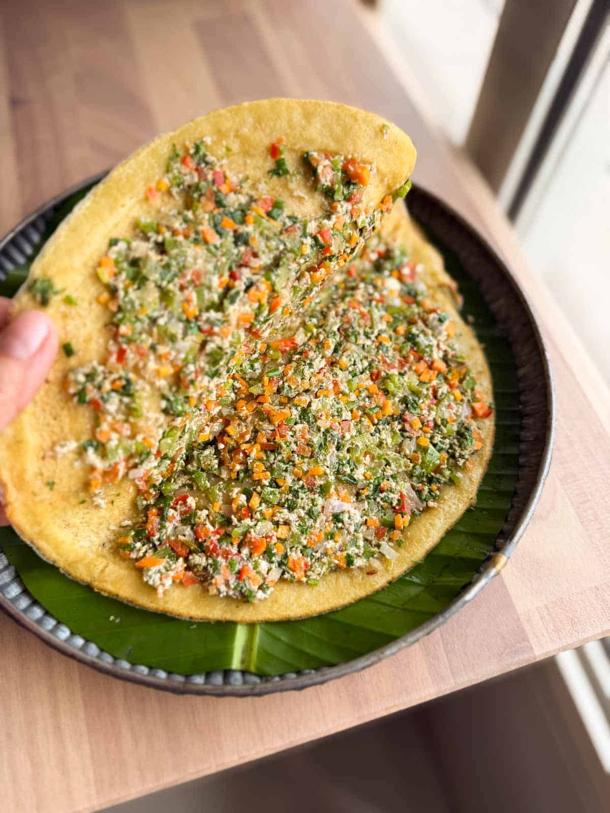 A picture showing the stuffing inside the moong dal chilla