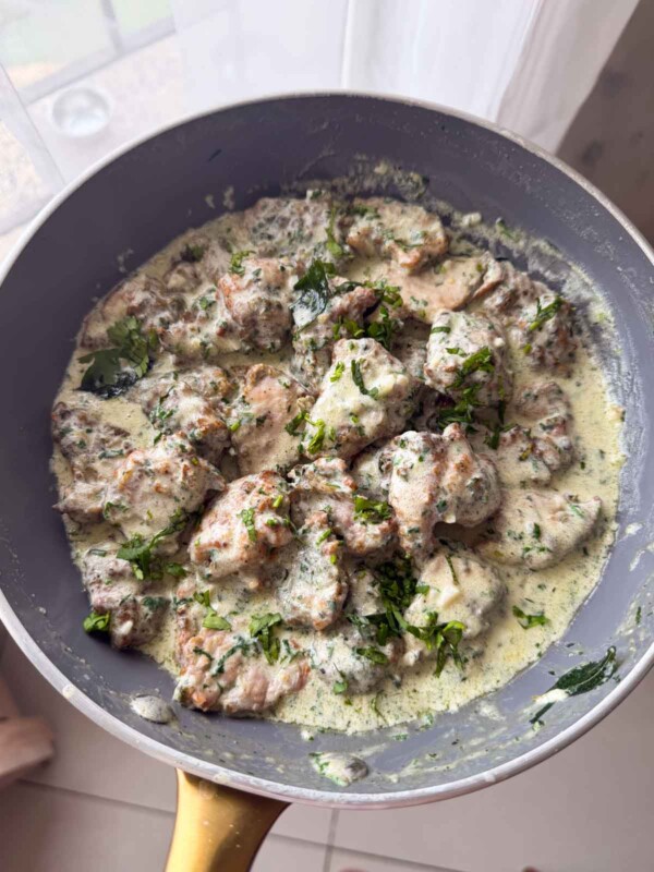 creamy coriander chicken in it's cooking pan